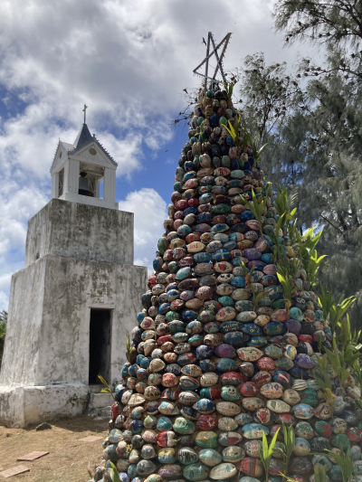 A Christmas tree in the Malesso Village on southern Guam that stands nearly 20 feet and is made of coconuts painted by individuals and families from across the island. 