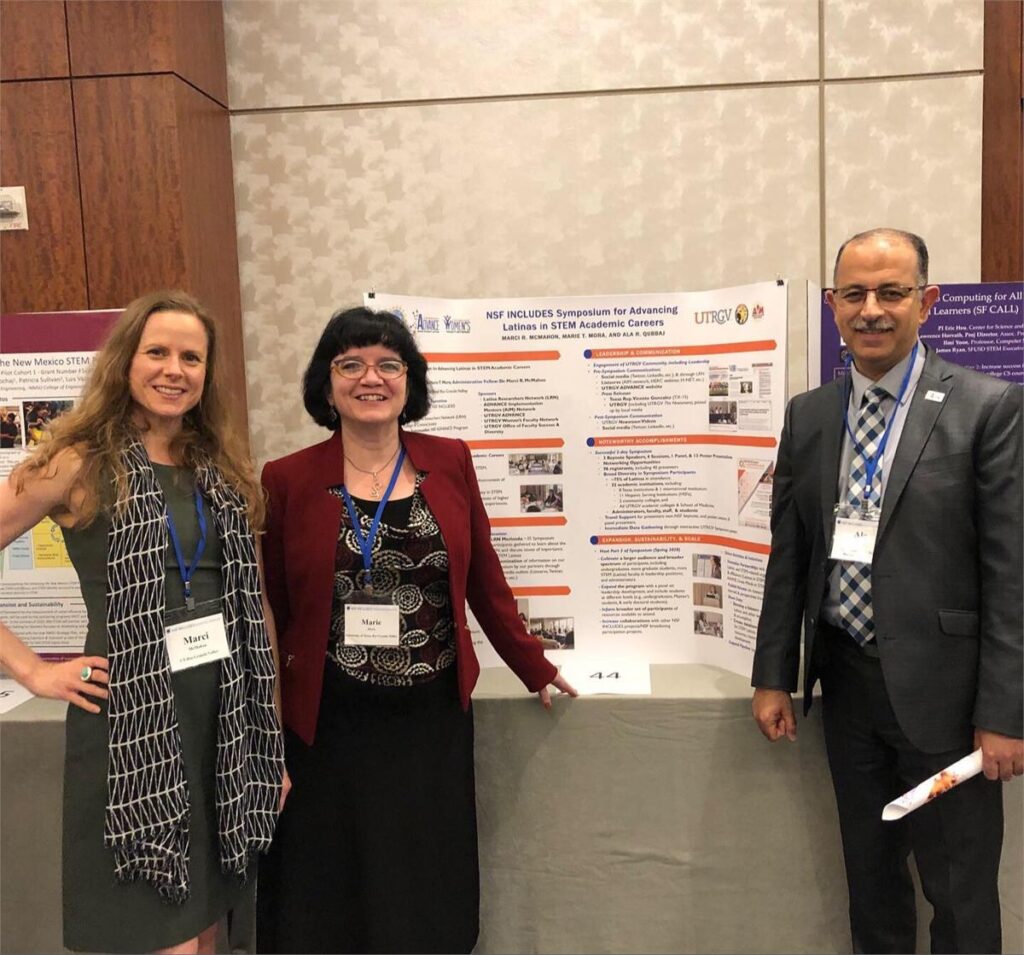 Three professionals present work from an academic poster. 